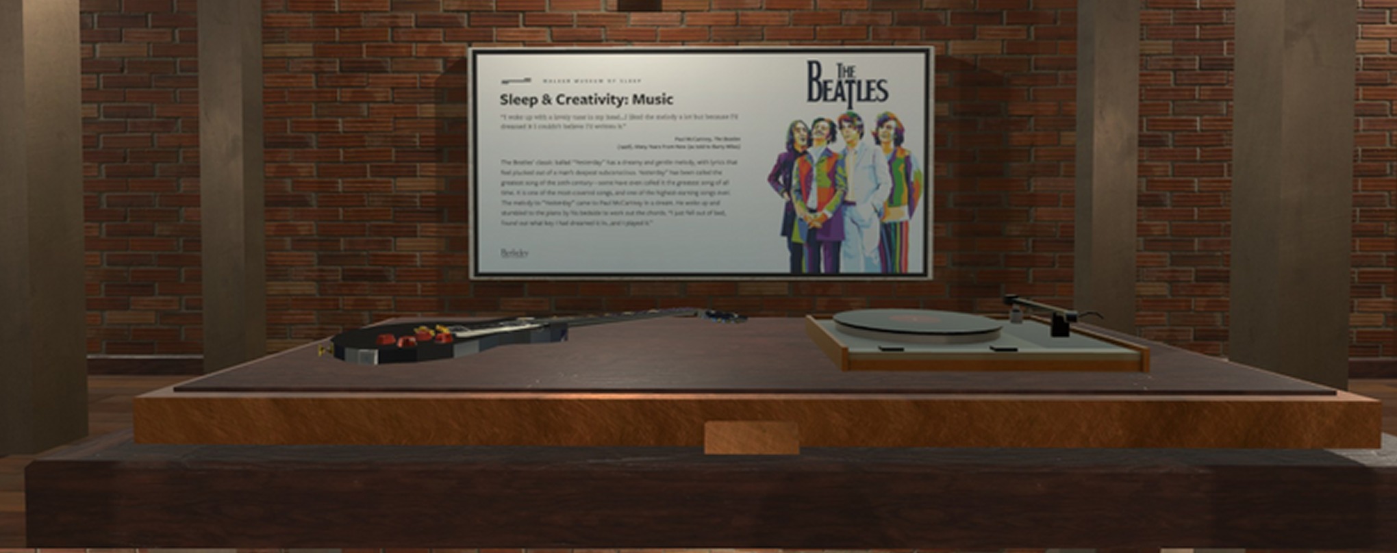 The Sleep and Creativity exhibit: a Beatles listening station with a record on the turntable
